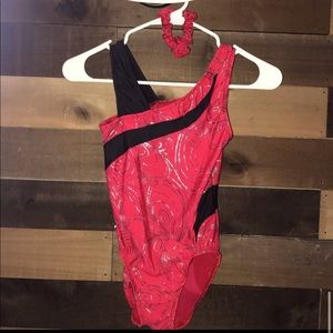 red and black gymnastics leotard